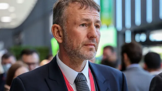 Андрій Мельниченко у костюмі на конференції щодо ролі Росії у безпеці